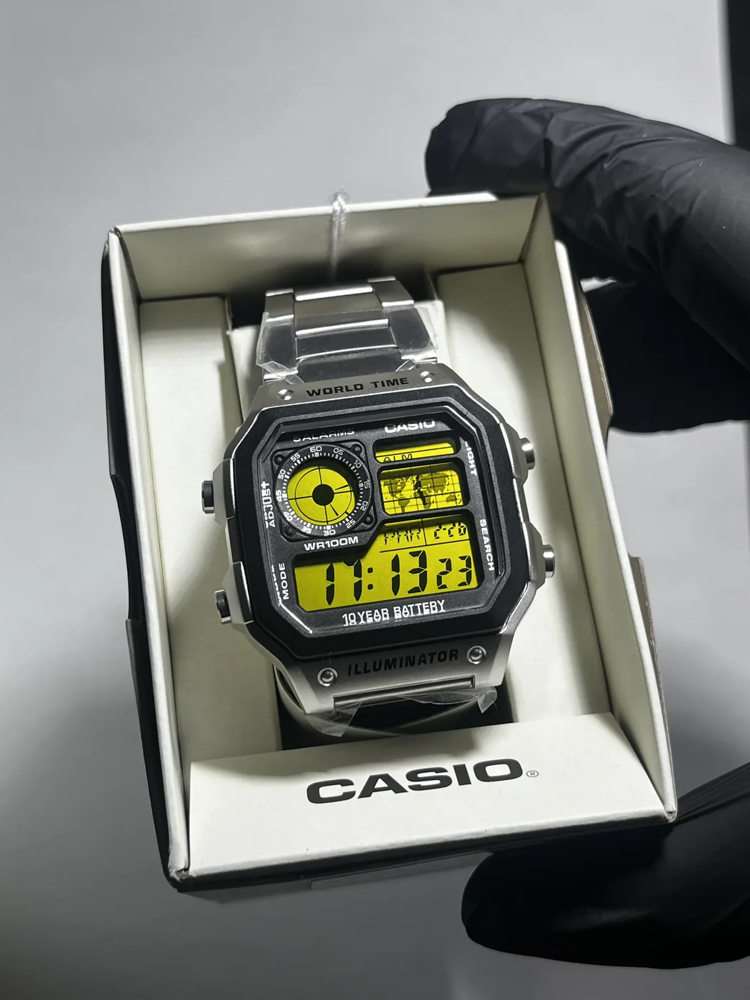 Casio AE1200 · Amarillo · Filtro de color