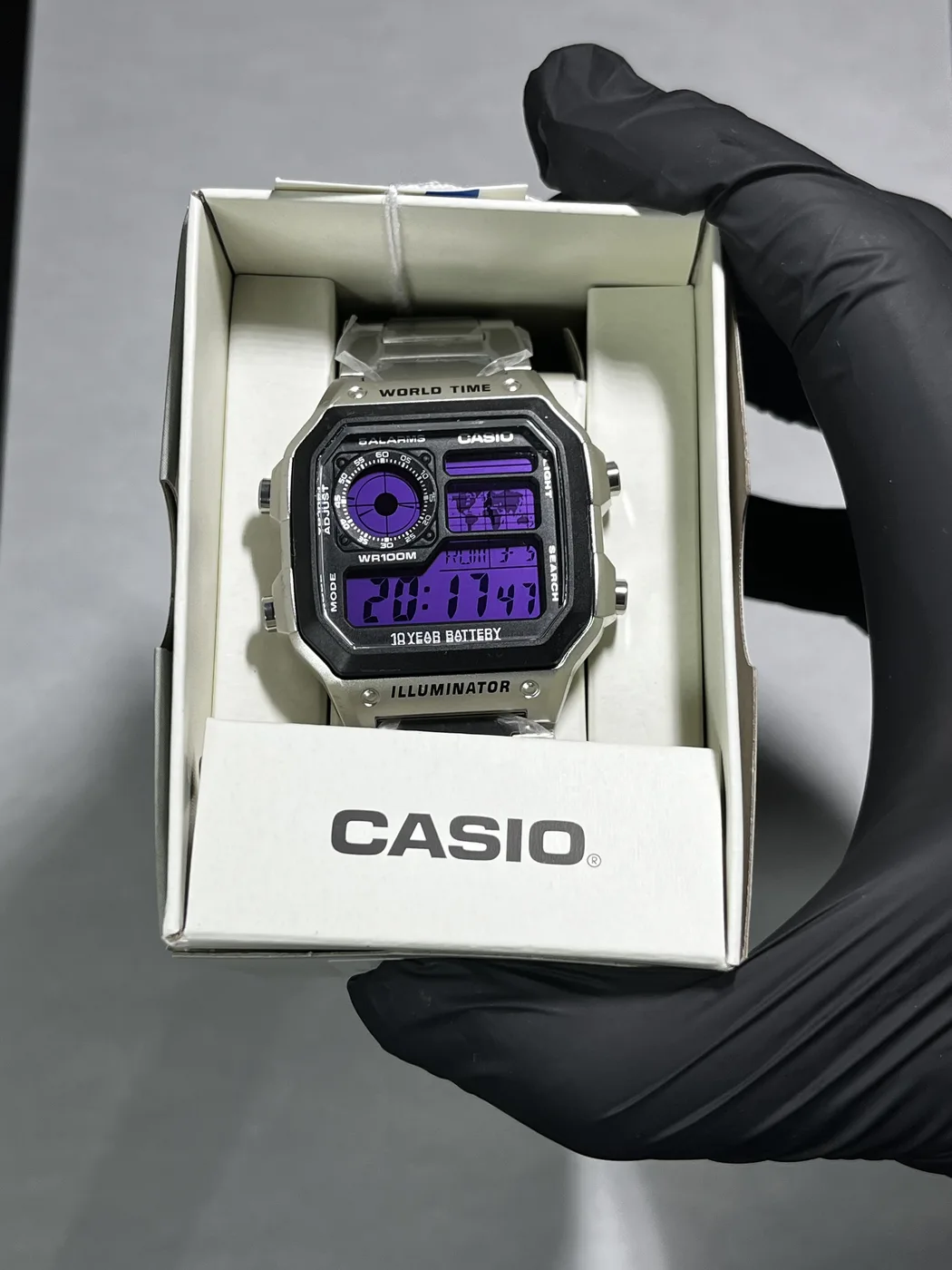 Casio AE1200 · Morado