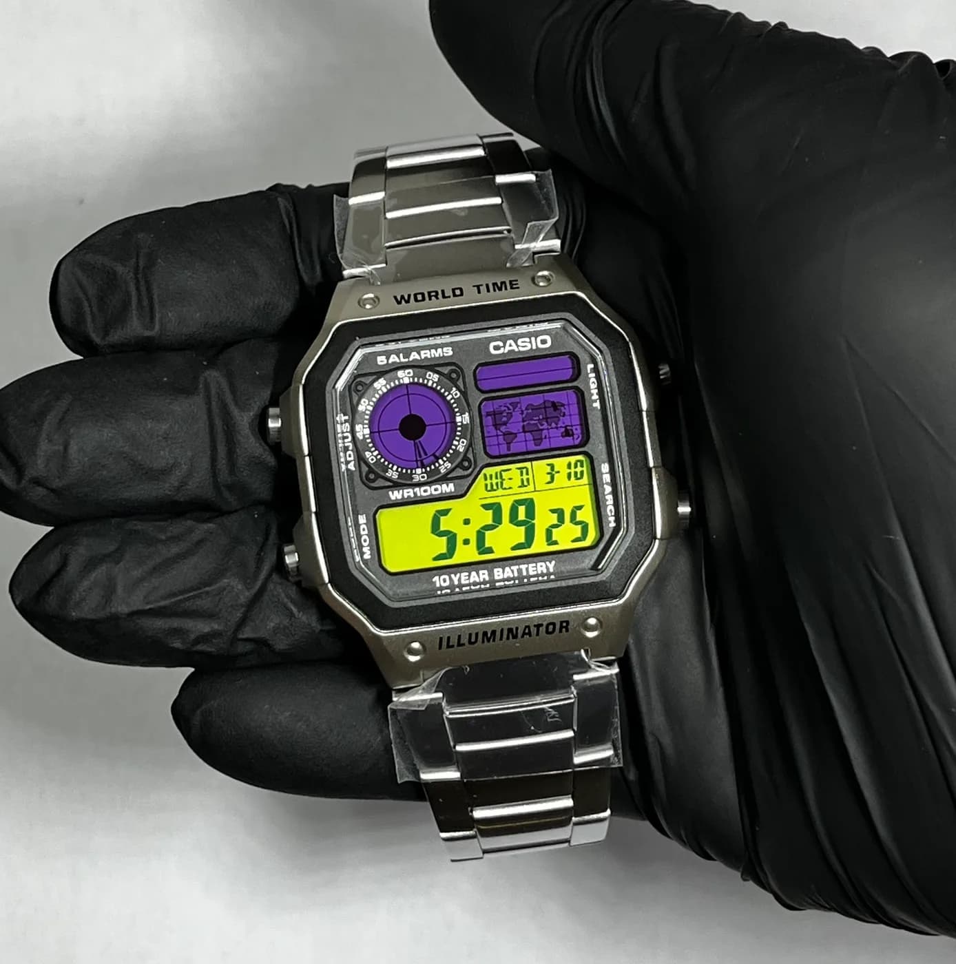 Casio AE1200 · Morado y Amarillo · Gradient