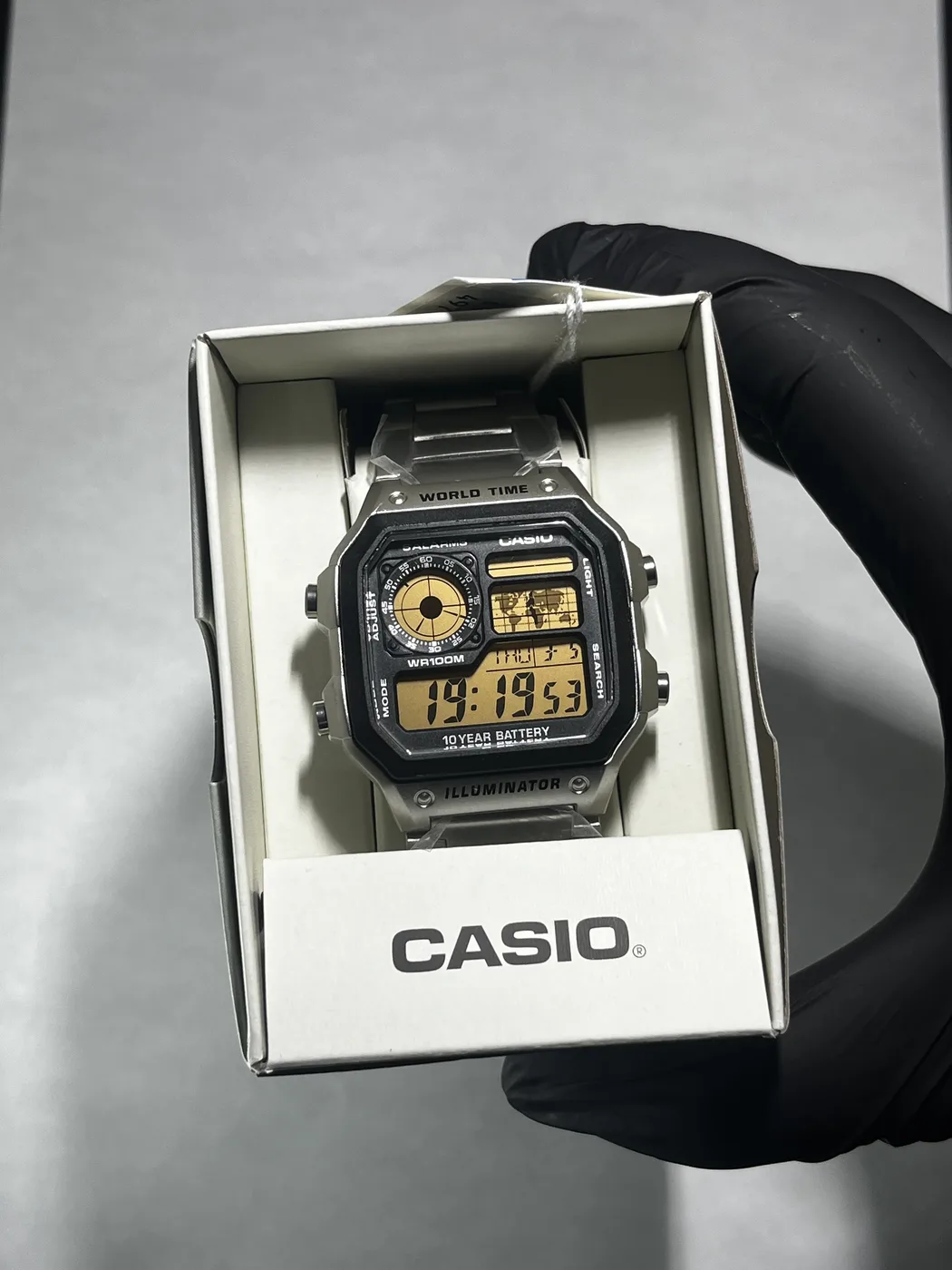 Casio AE1200 · Naranja