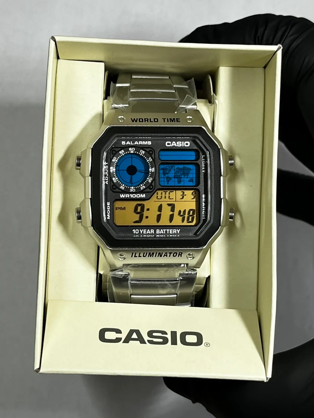 Casio AE1200 · Naranja y Azul · Degradado