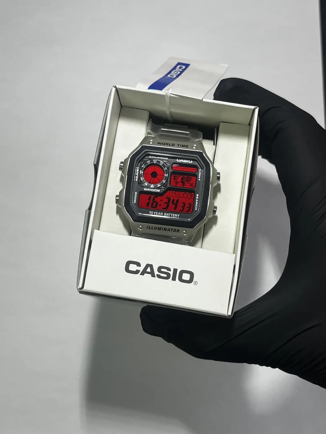 Casio AE1200 · Rojo