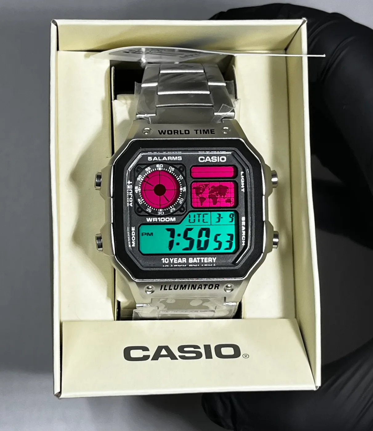 Casio AE1200 · Rosa y Turquesa · Degradado